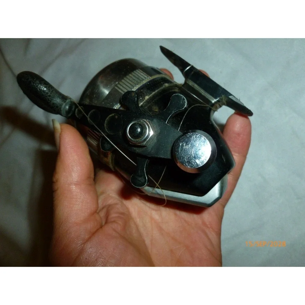 Vintage Sportfisher Spincast Fishing Reel Black Chrome Push Button Star Drag